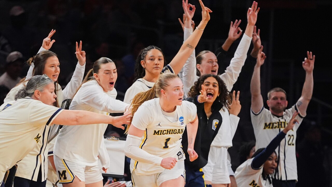 APTOPIX NCAA Louisville Michigan Basketball