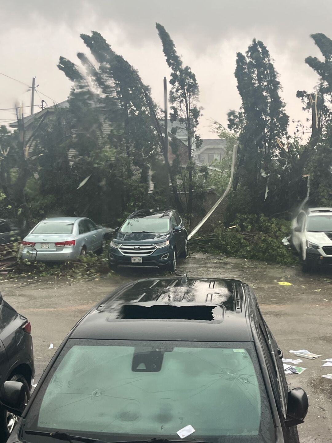 Strong winds damaged an office building on Fourth Street in Menasha Monday afternoon 