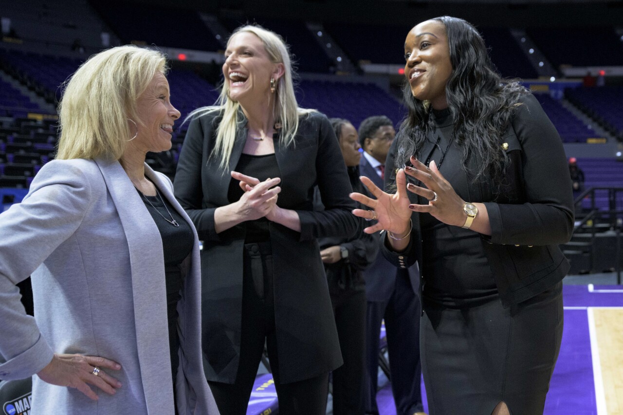 Sue Semrau speaks with associate head coach Brooke Wyckoff and Missouri State head coach Amaka Agugua-Hamilton before 2022 First Four game