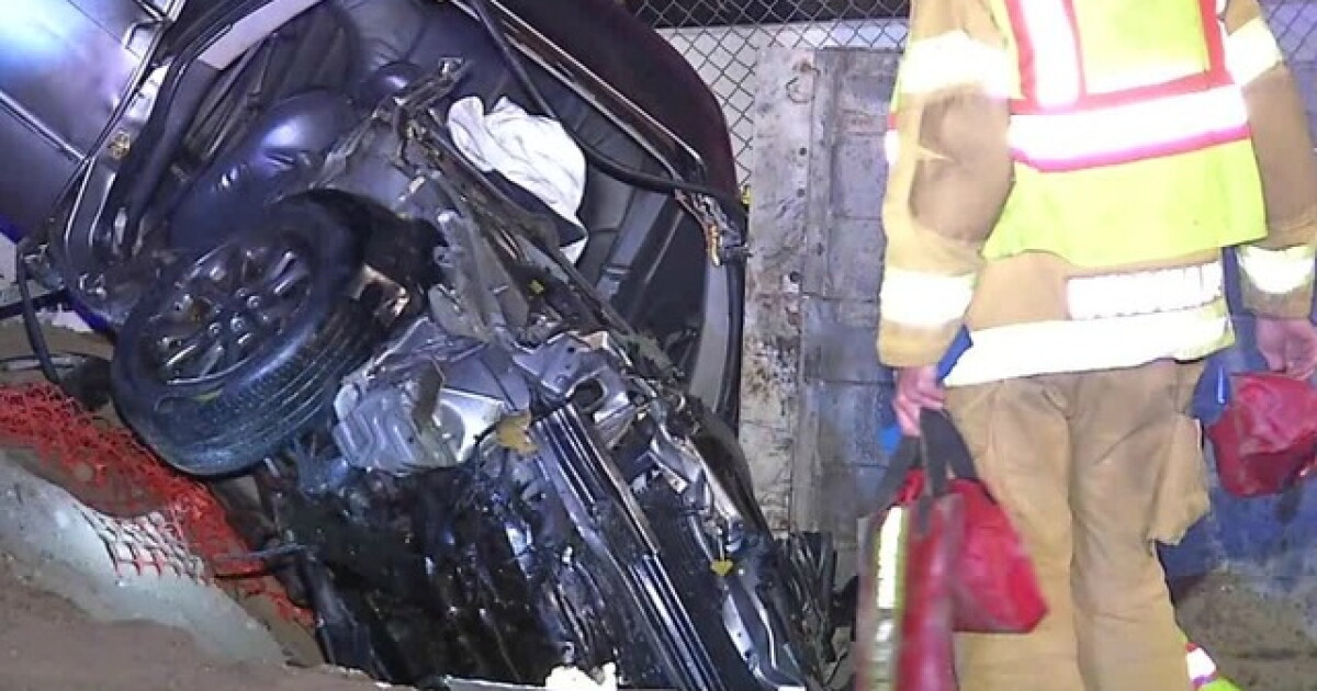 4 injured when car crashes into concrete barrier