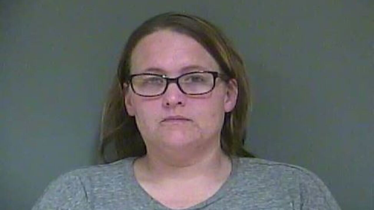 Former employee accused of stealing checks meant for students at
