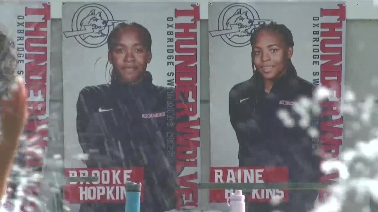 Brooke and Raine Hopkins, pictured on posters for Oxbridge Academy Thunderwolves