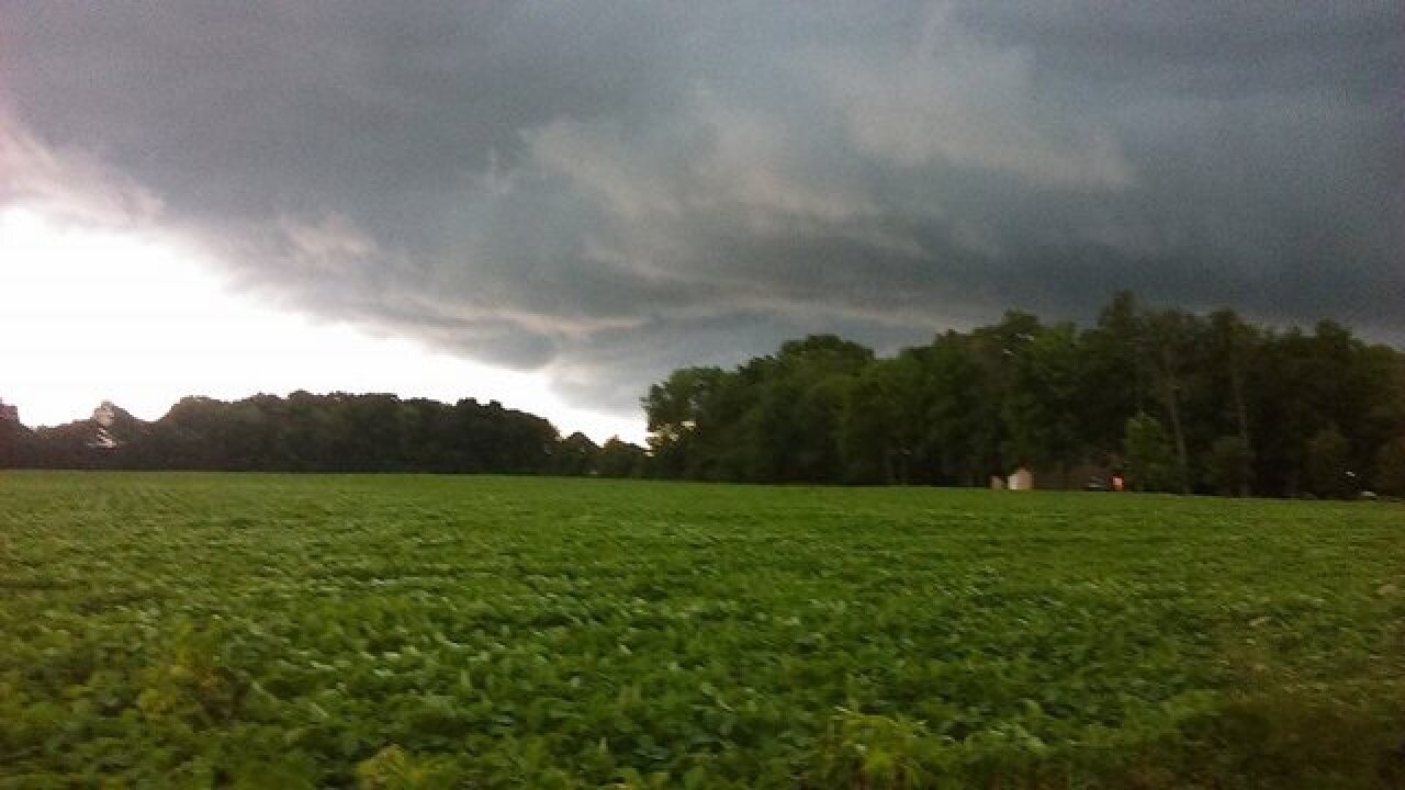 PHOTOS: Ominous skies and storm damage