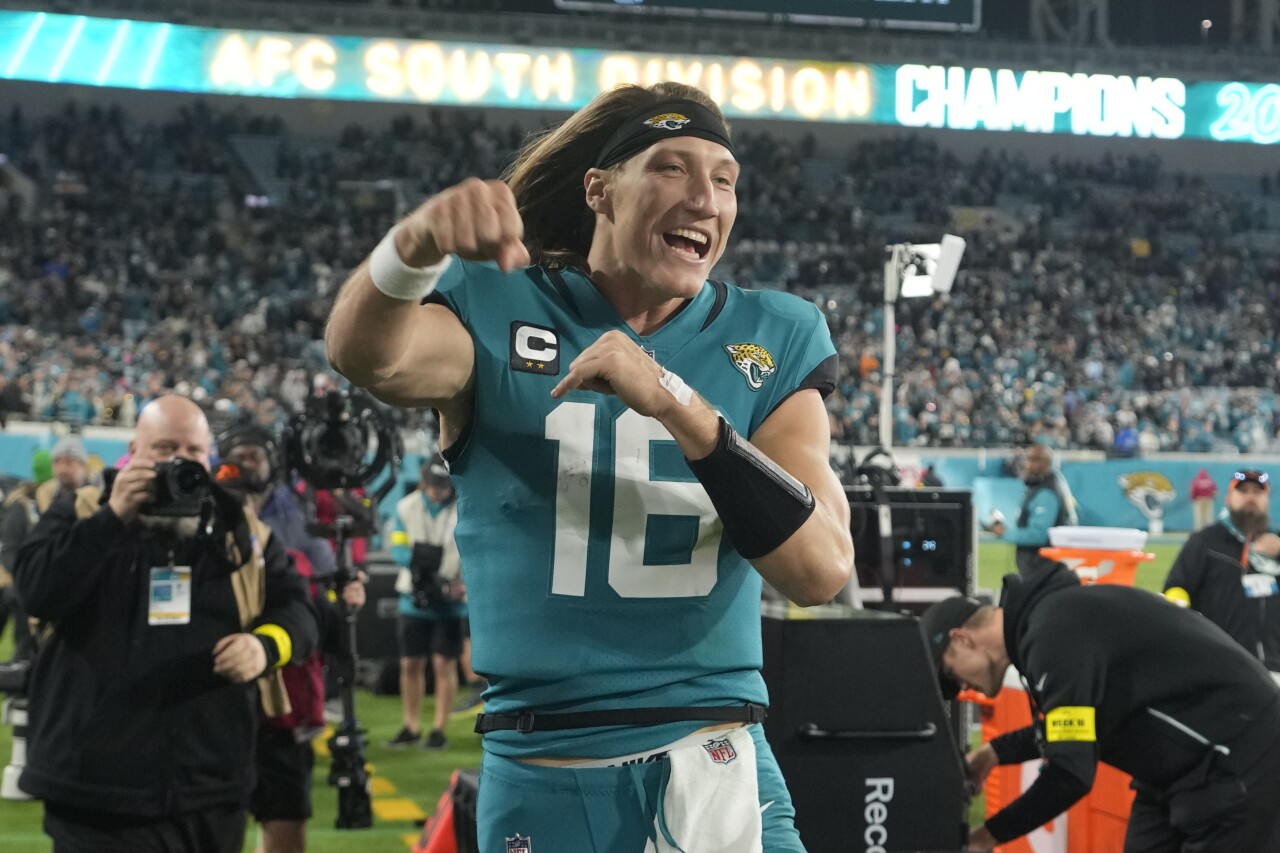 Jacksonville Jaguars QB Trevor Lawrence celebrates after beating Tennessee Titans to win AFC South, Jan. 7, 2023