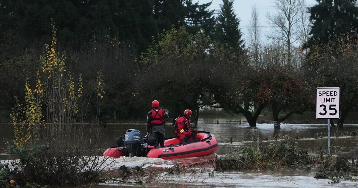 Record flooding threatens Washington as more heavy rain pounds the Northwest