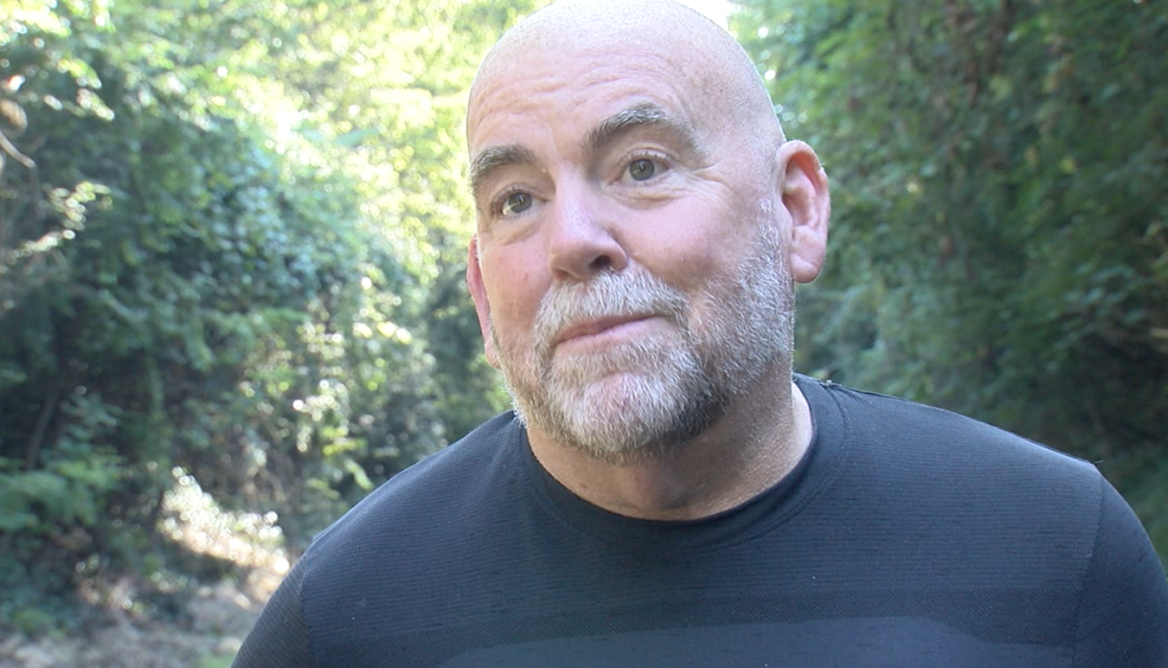 David Campbell walks his dog on the Wasson Way Trail on Sept. 28, 2021.