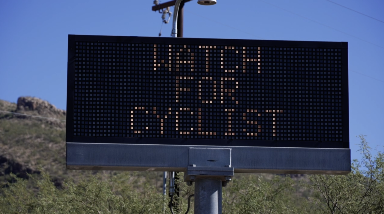 Watch for cyclist sign