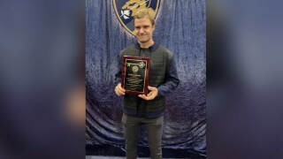 Florida captain Aleksander Barkov holds the key to the city proclamation awarded to him by the Boca Raton Mayor
