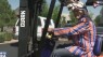 Broncos fans paint their forklift orange & blue