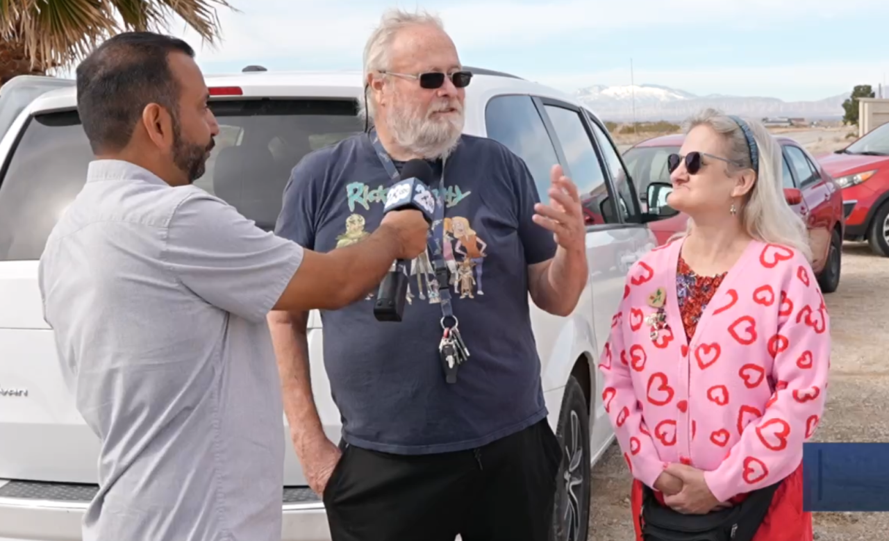 Steve interviewing Glenn and Laurie, California City residents, about how the food is helping those in need