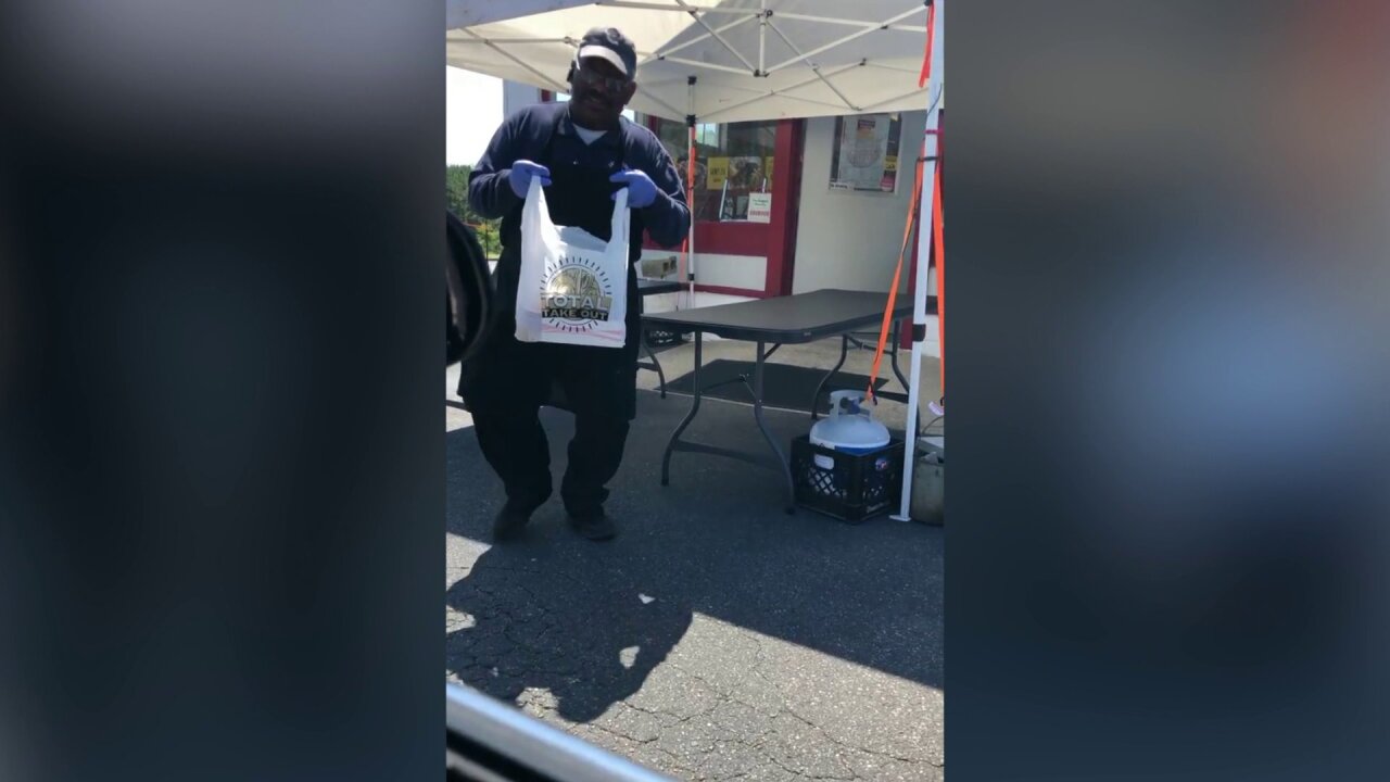 Ronnie Logan delivers a to-go order