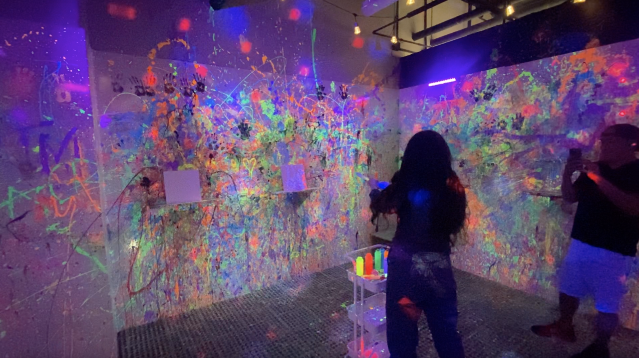 “It’s black lights, strobe lights, glow in the dark paint… and it’s a freestyle type of way to make art,” explained Peña.
