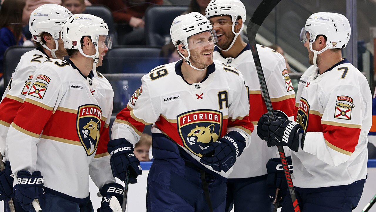 Florida Panthers left wing Matthew Tkachuk (19) is congratulated by teammates after scoring his second goal in the first period an NHL hockey game against the New York Islanders, Saturday, March 28, 2026, in Elmont, N.Y. 