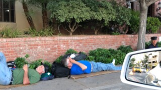 A Las Vegas law firm says they are inundated with homeless people after a recent park closure has forced them onto sidewalks and back alleys for their bathroom needs and sex acts