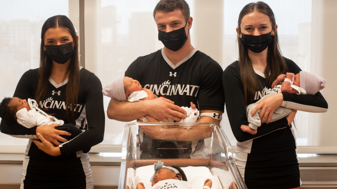 UC Health cheerleaders with babies