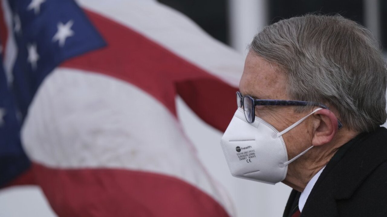 WCPO dewine in mask.jpeg