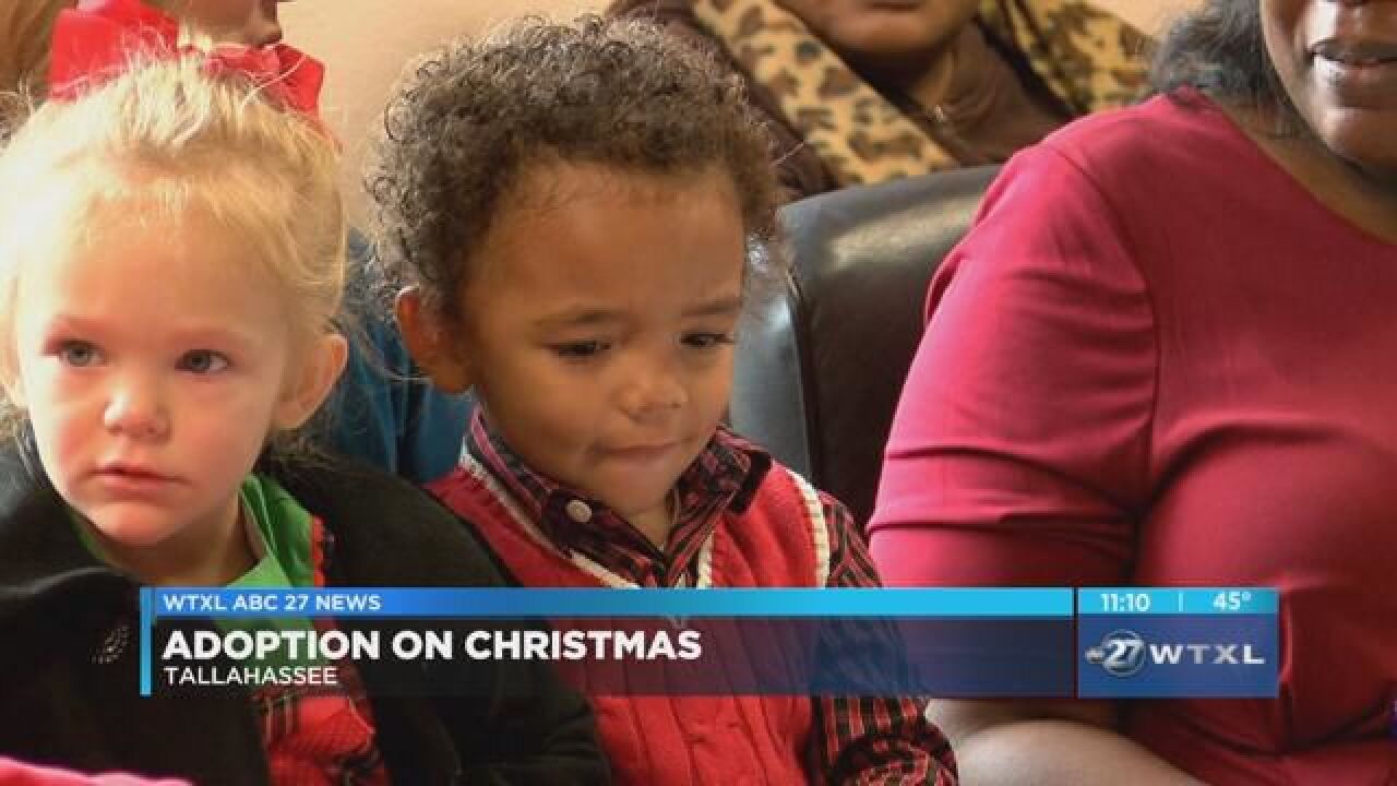 Families adopt children on Christmas Day
