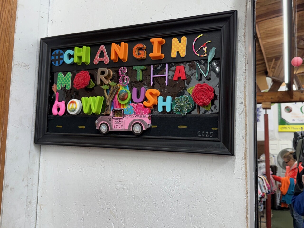 store sign motto.jpg