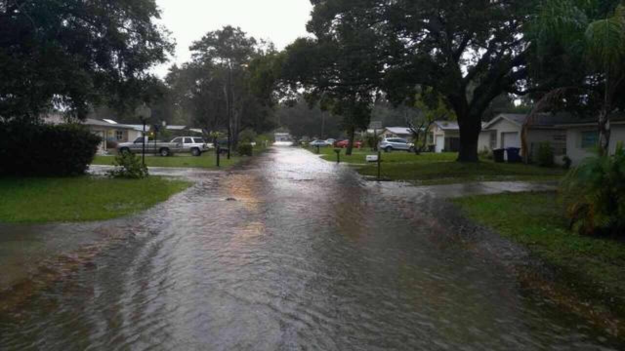 PHOTOS | Tropical system causing flooding