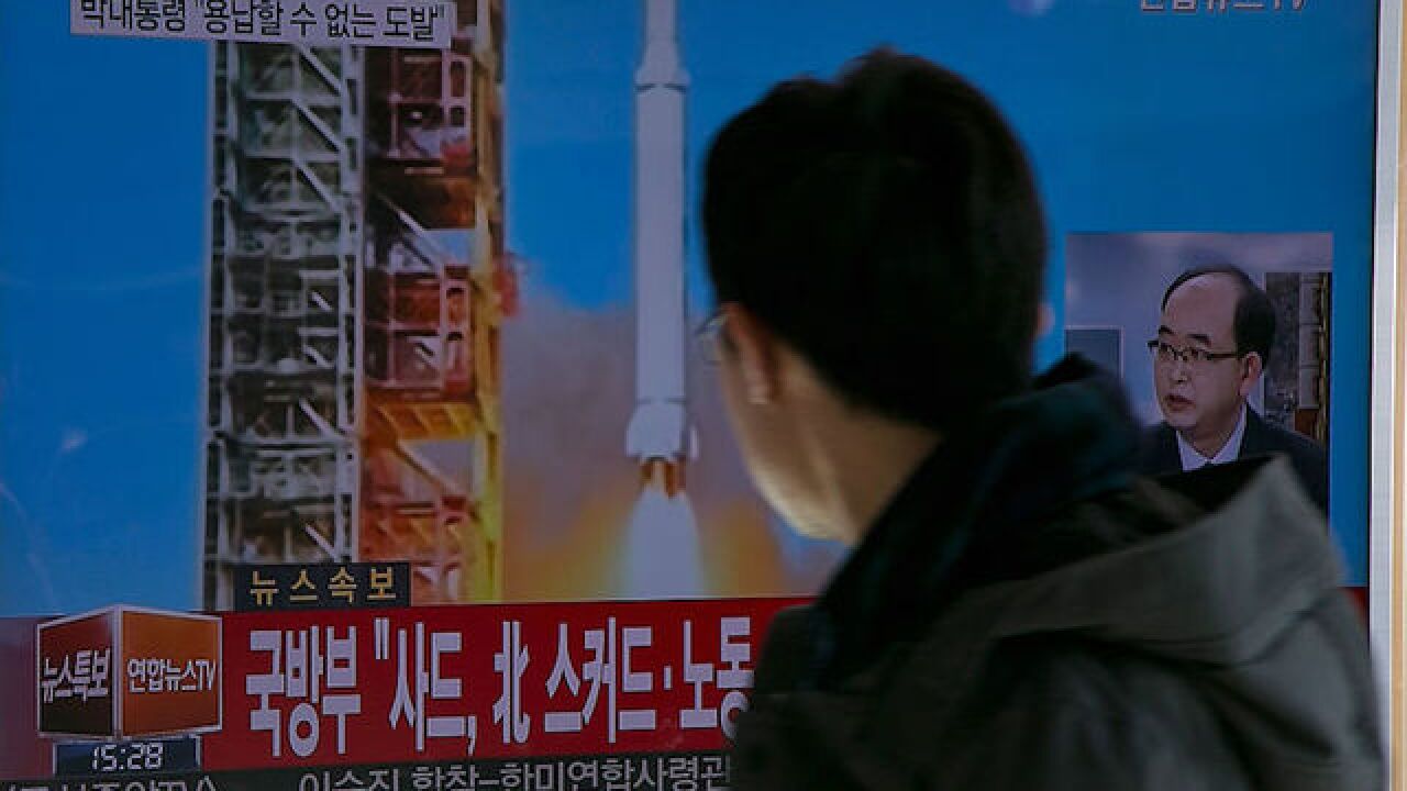 North Korea fires four ballistic missiles into Sea of Japan, PM Abe says