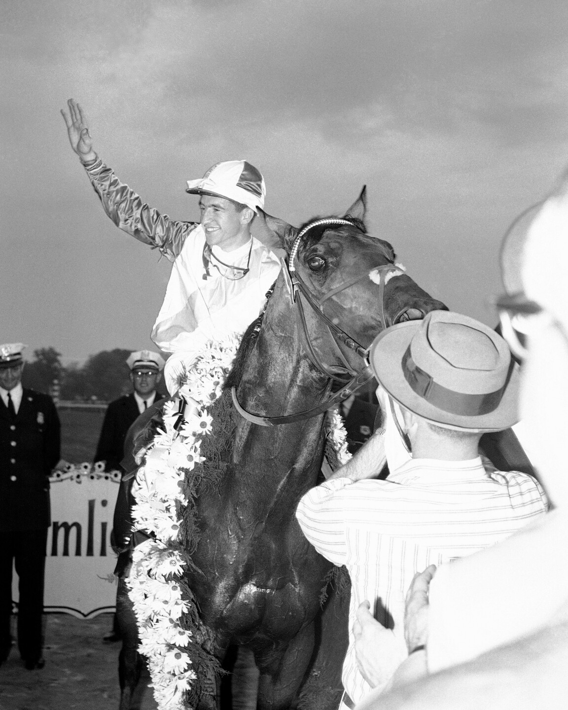 Robert Ussery with horse Bally Ache after winning 1960 Preakness Stakes