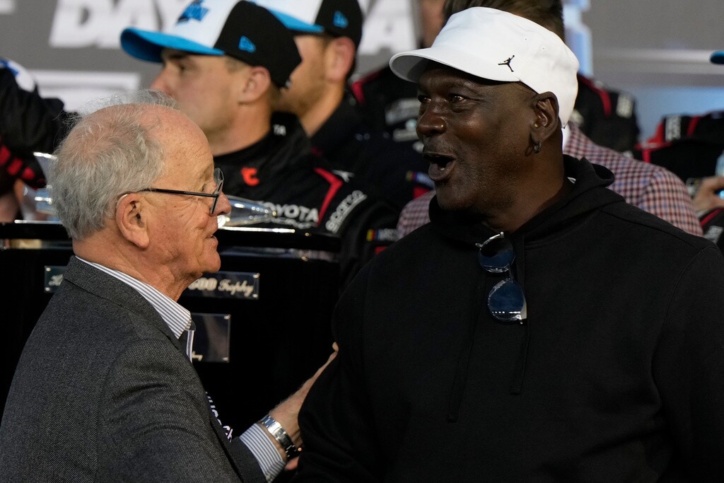 23XI Racing owner Michael Jordan speaks with CEO and Chairman of NASCAR, Jim Frantz after Tyler Reddick won the NASCAR Daytona 500 auto race at Daytona International Speedway, Sunday, Feb. 15, 2026, in Daytona Beach, Fla.