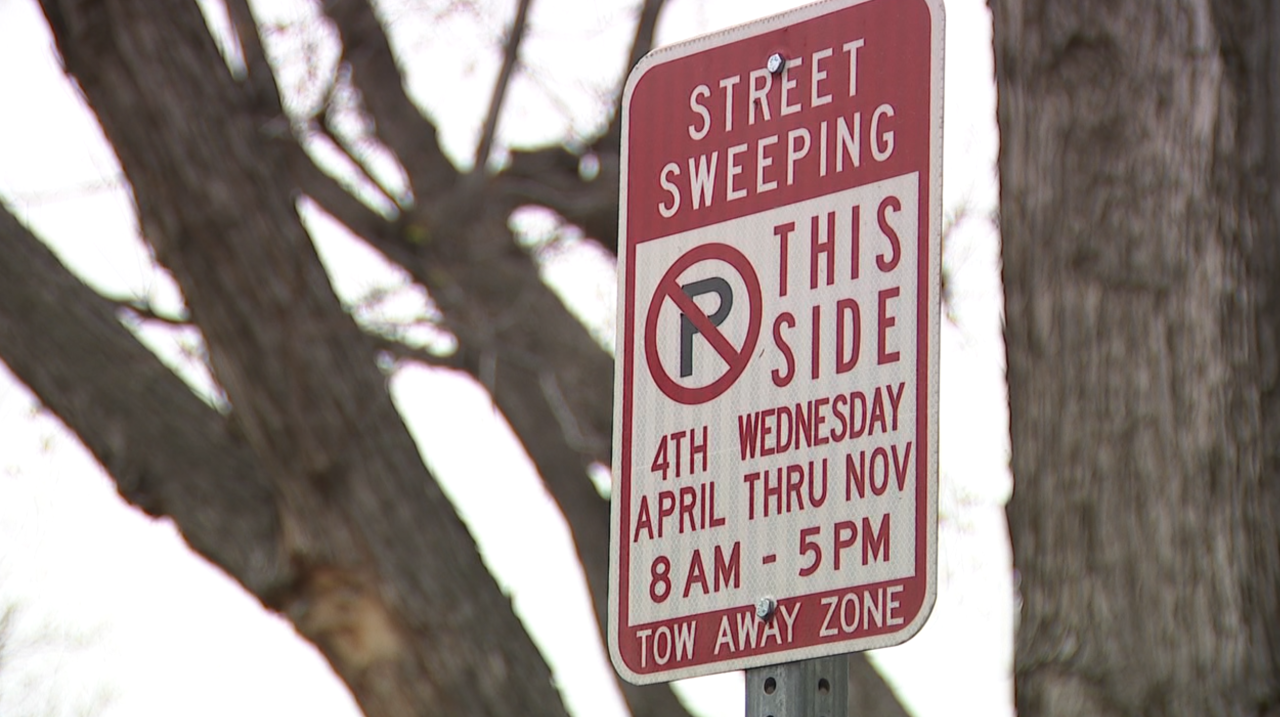 Denver street sweeping sign