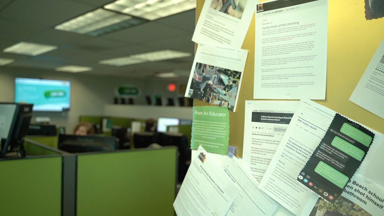 news-articles-detailing-school-shootings-and-attempted-school-shootings-are-stapled-to-a-wall-in-the-crisis-center-WFTS.jpg