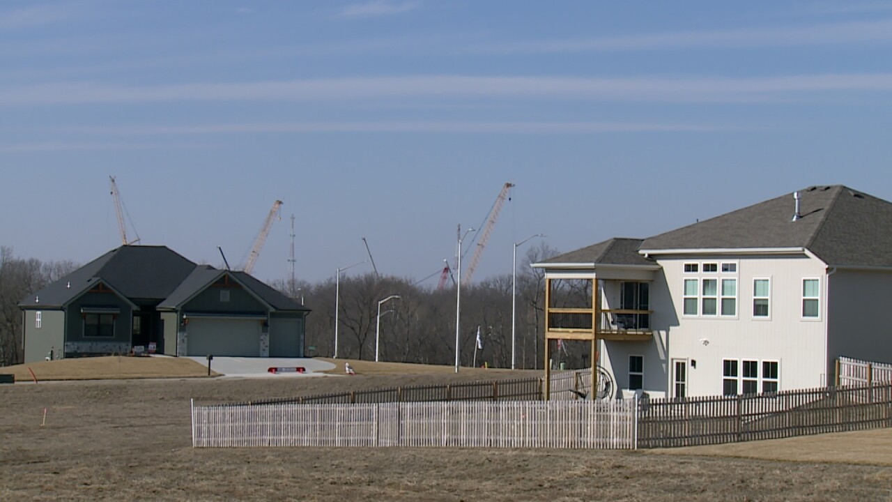 Houses under a crane.jpg