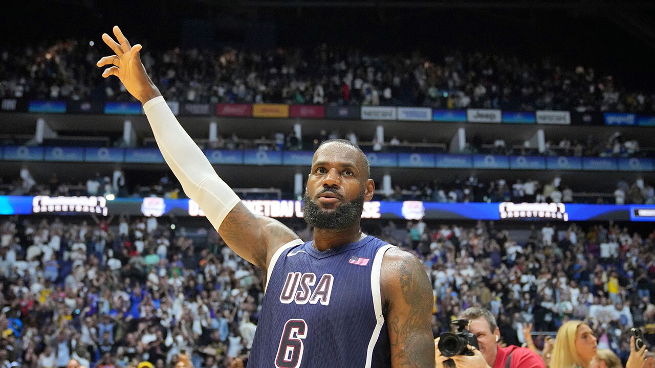 United States' forward LeBron James waves to the crowd after the end of an exhibition basketball game between the United States and South Sudan, at the o2 Arena in London, Saturday, July 20, 2024. 