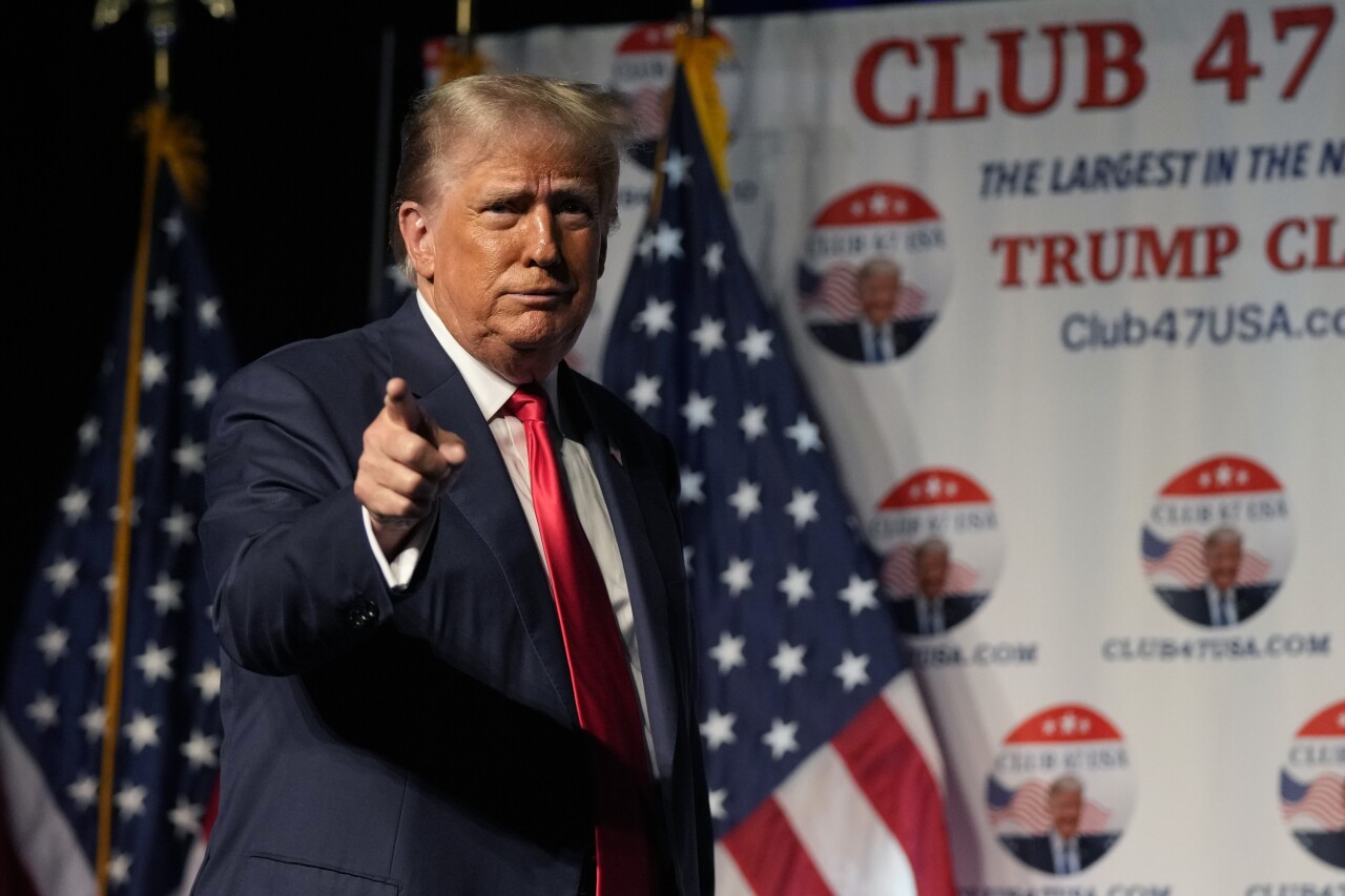Former President Donald Trump gestures after speaking at Club 47 USA event in West Palm Beach, Oct. 11, 2023
