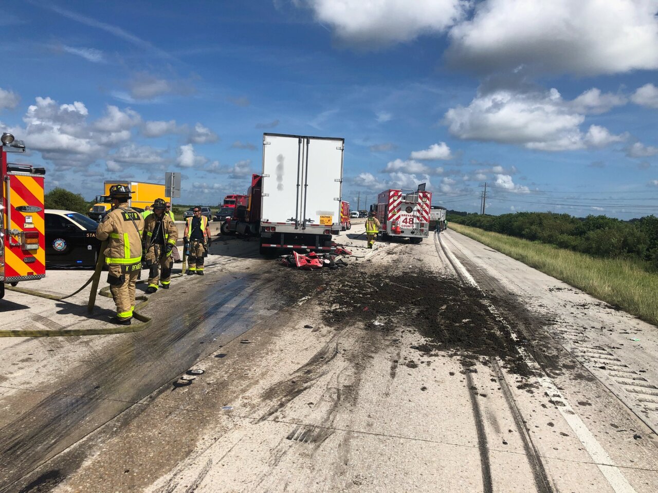A crash involving a tractor trailer and a dump truck left cow manure over a portion of Interstate 95.