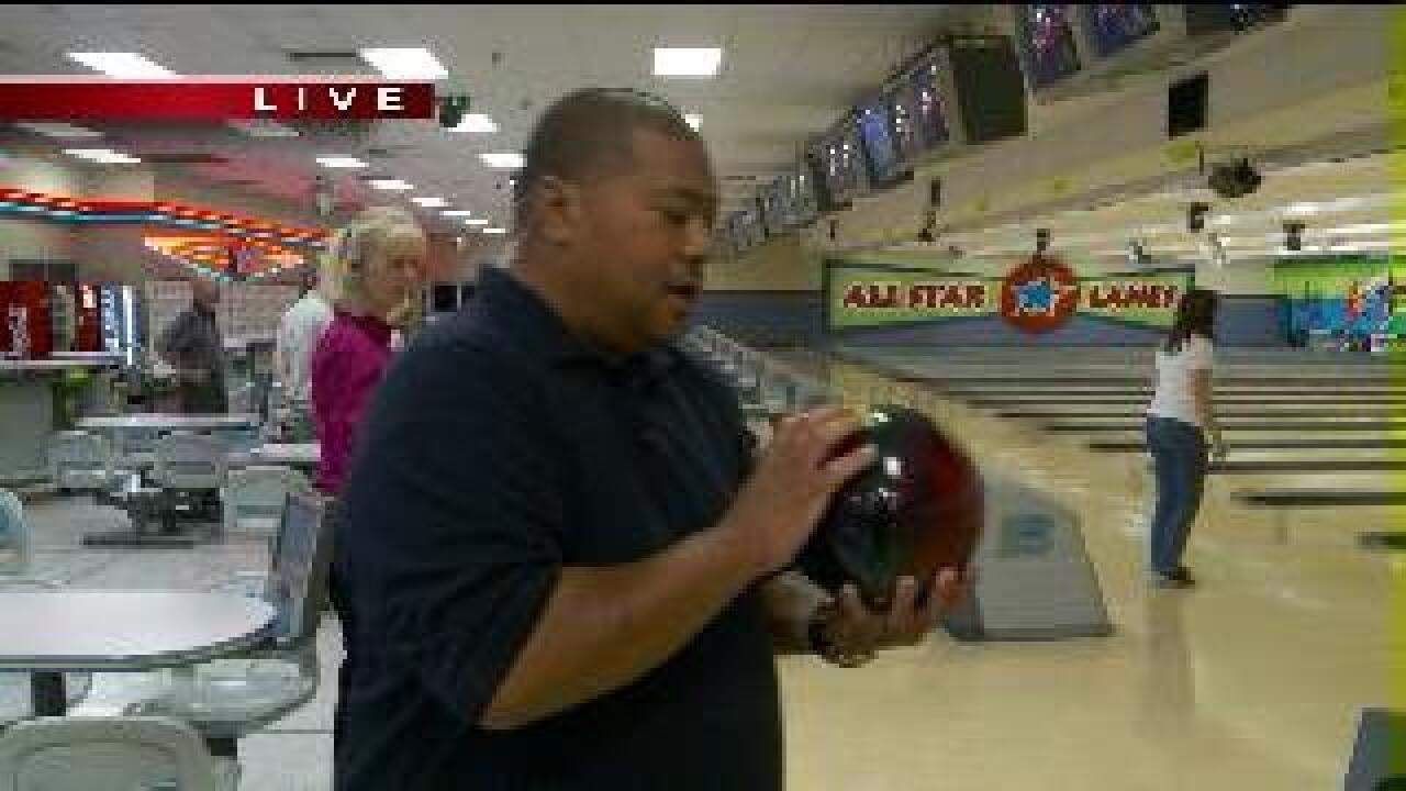 Big Budah learns bowling basics