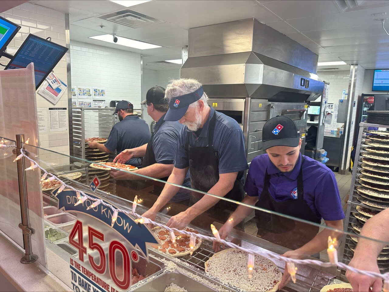 Local Domino's Pizza store managers donate 600 pizzas on Christmas Eve