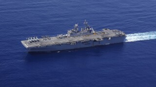 USS Iwo Jima and the USS Fort Lauderdale conduct underway operations