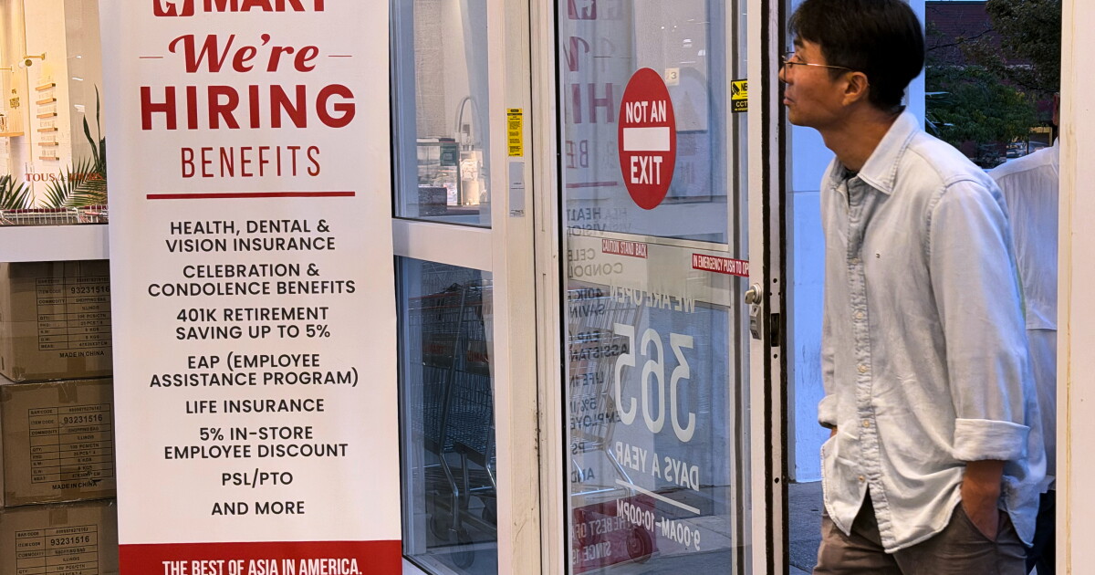 Claims for unemployment benefits drop to 197,000, the lowest since mid-July as layoffs remain rare