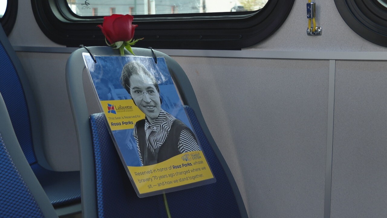 LCG honors Rosa Parks by saving her a seat on a city bus