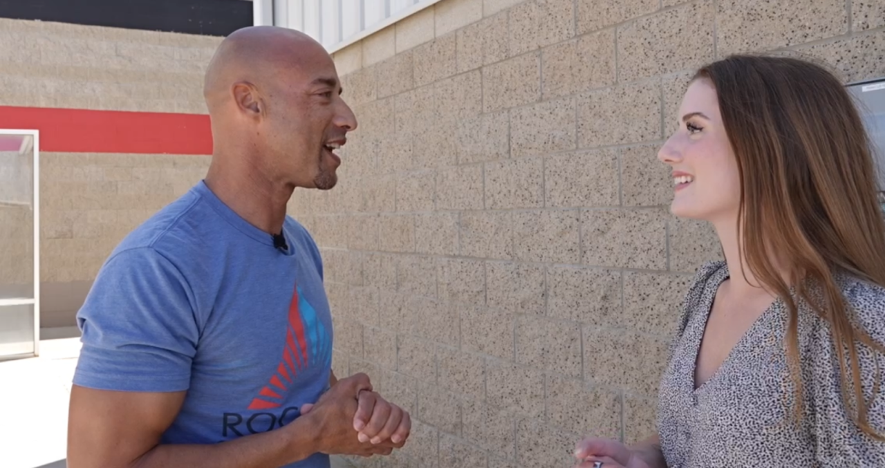 Neighborhood News Reporter Grace Laverriere interviewing Jason Grant, who says he was part of this program 14 years ago.