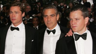 Actors Brad Pitt, George Clooney and Matt Damon attend the premiere for the film 'Ocean's Thirteen' at the Palais des Festivals during the 60th International Cannes Film Festival on May 24, 2007 in Cannes, France. (Photo by Peter Kramer/Getty Images)