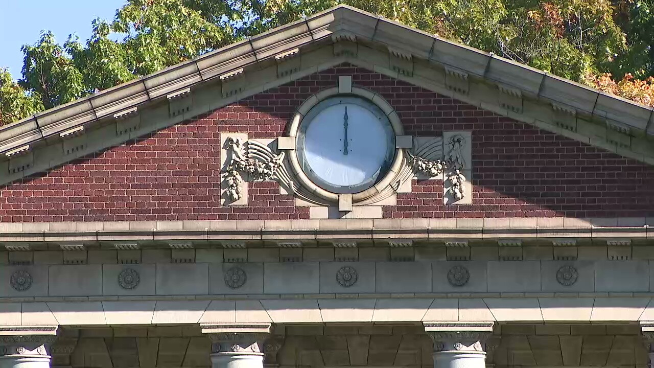 A clock adorns the facade of one of the Georgian Revival-style buildings at Nela Park.