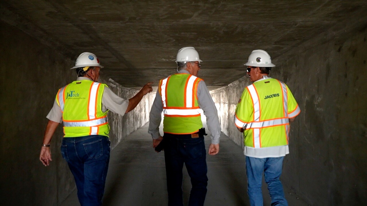 Walking through one of dams of the C-43 Reservoir.