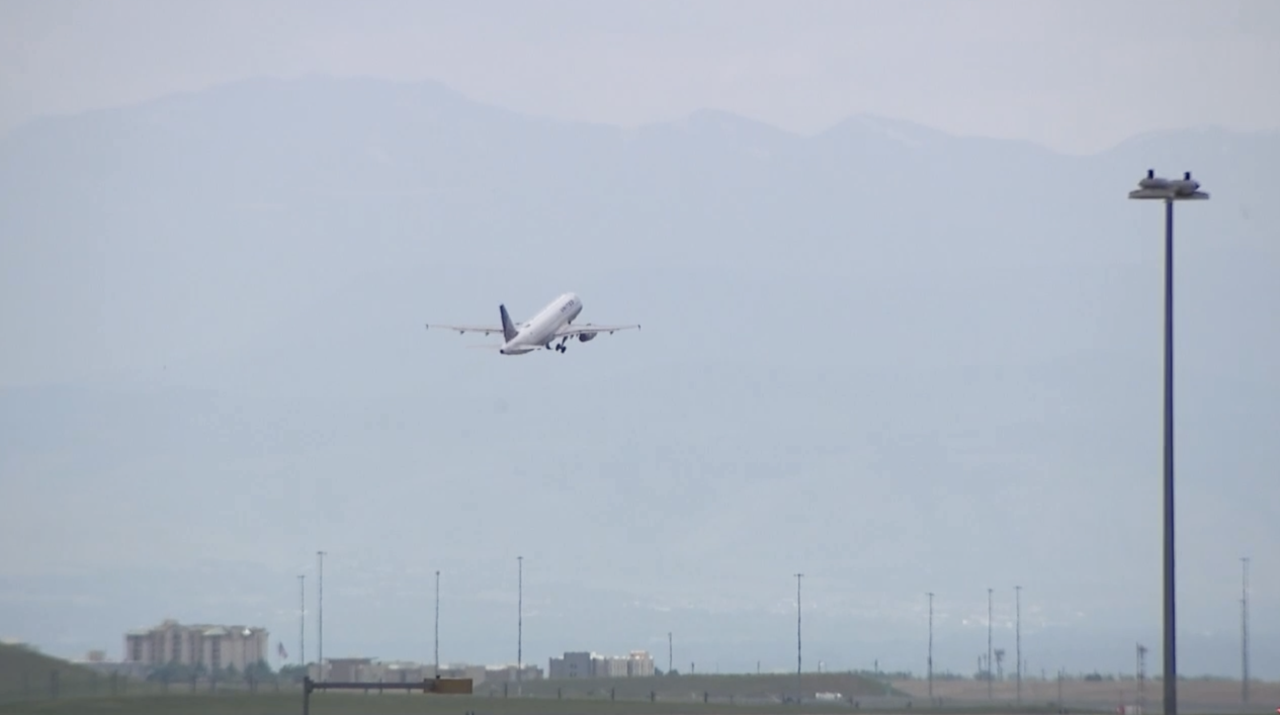 A plane takes off at Denver International Airport.