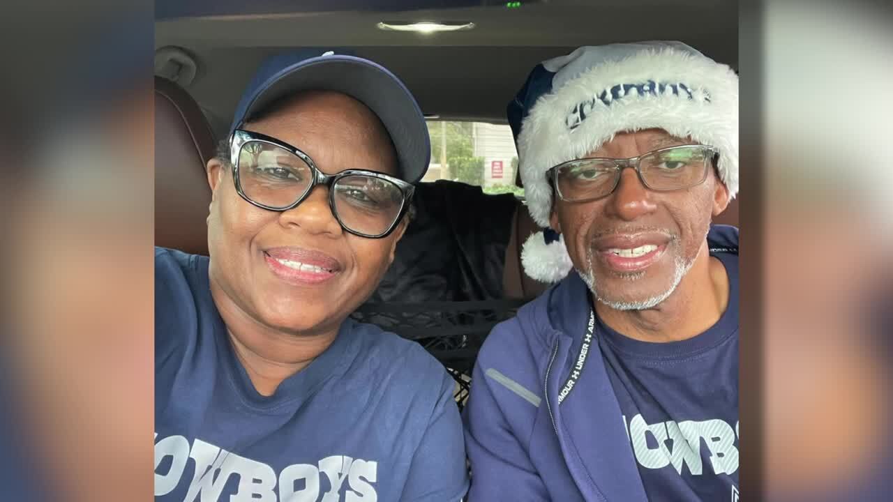 Roosevelt 'Kent' Benjamin with wife wearing Dallas Cowboys clothing