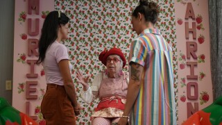 Muriel speaking with fans 