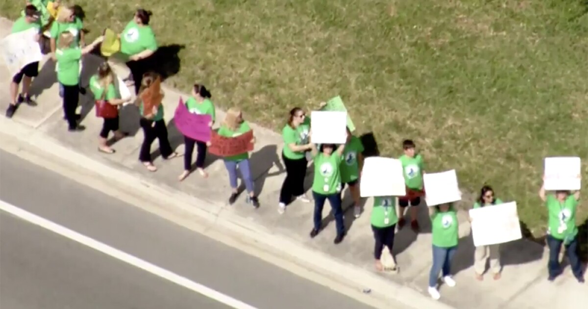 Palm Beach County teachers rally for pay raises