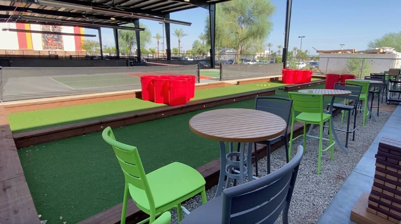 This area outside features Bocce Ball and the place is also designated for guests to plat the Giant Yard Pong Game.