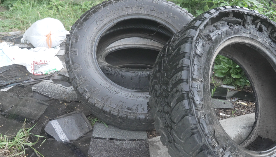 Tires in parking lot at Sprink Lake Park