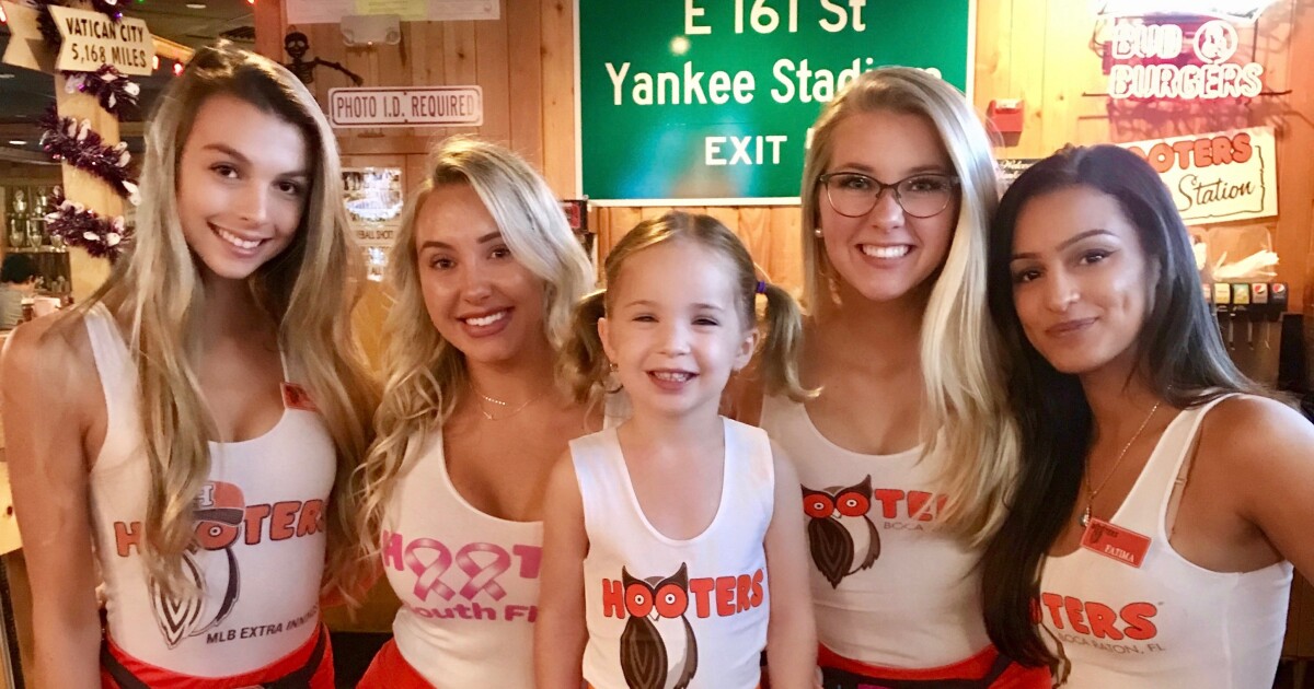 Children in costume eat for free at Hooters on Halloween