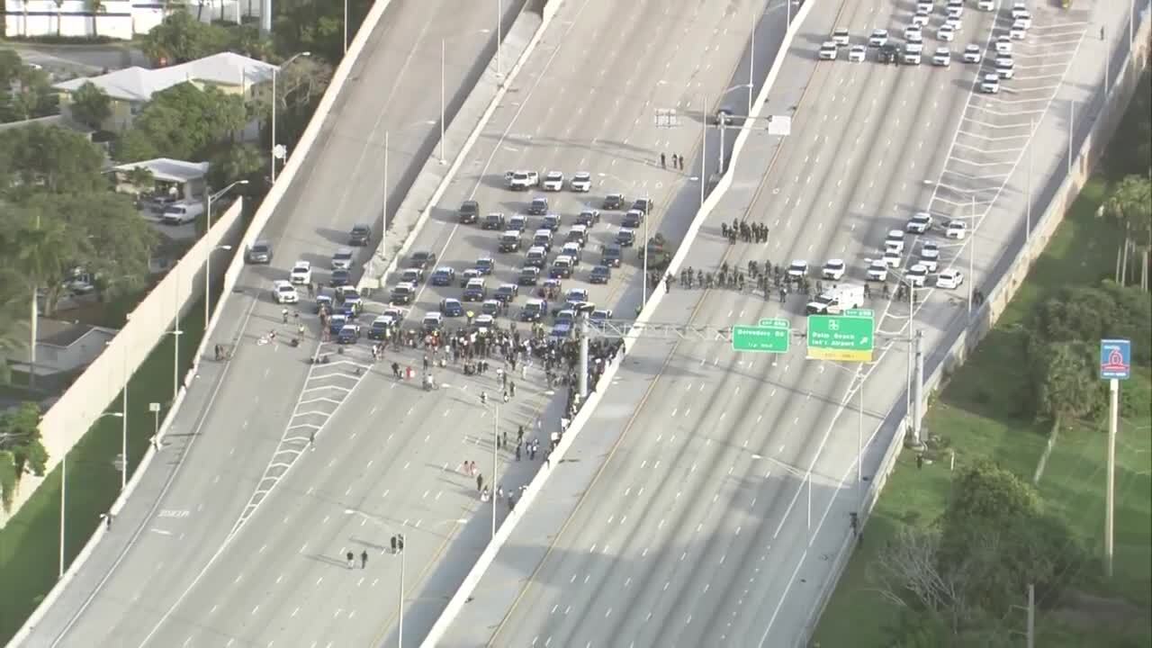 Aerial view of protesters involved in standoff with law enforcement on I-95