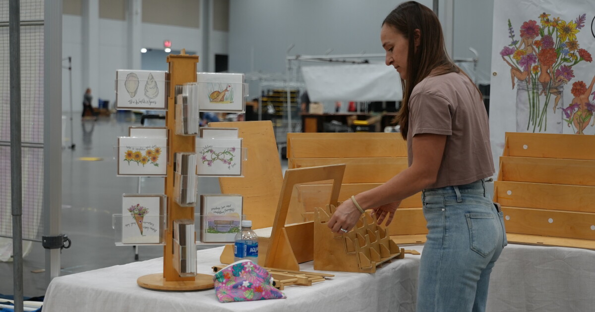 Neptune Festival vendors set up inside as winds move Art and Craft Show